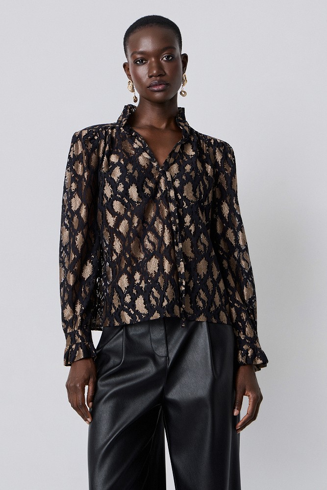 Animal-print blouse with lace and shoulder pads