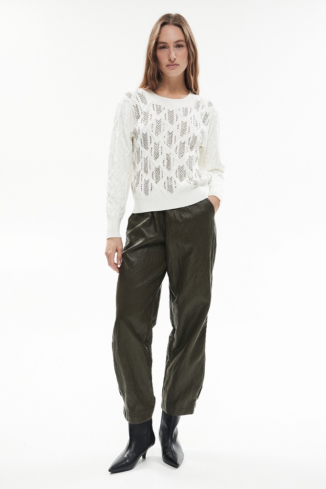 Knitted sweater with textured pattern and rhinestones
