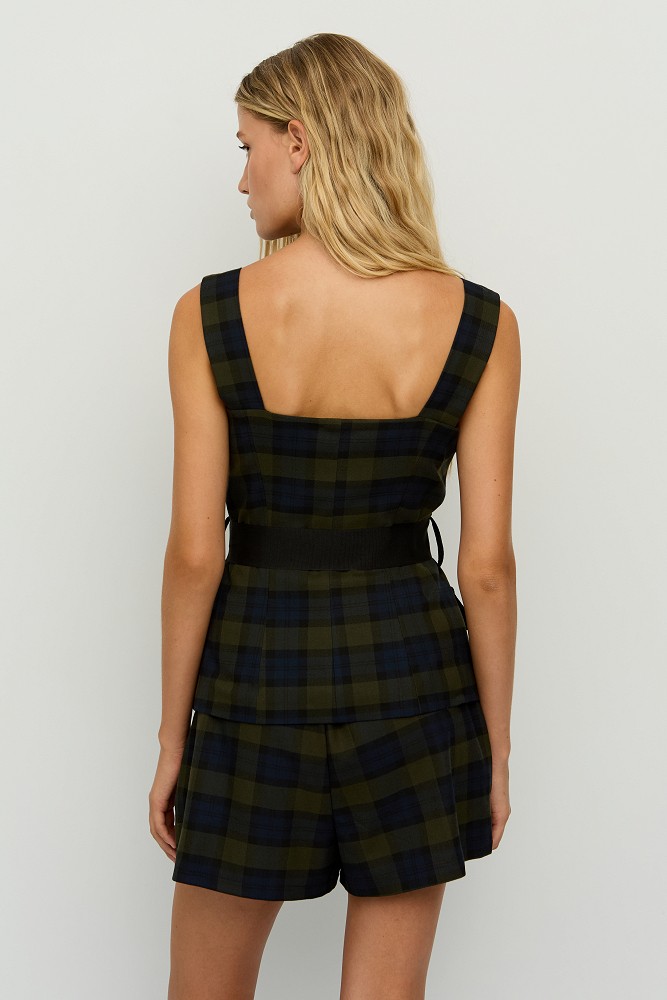 Checked top with a waist belt