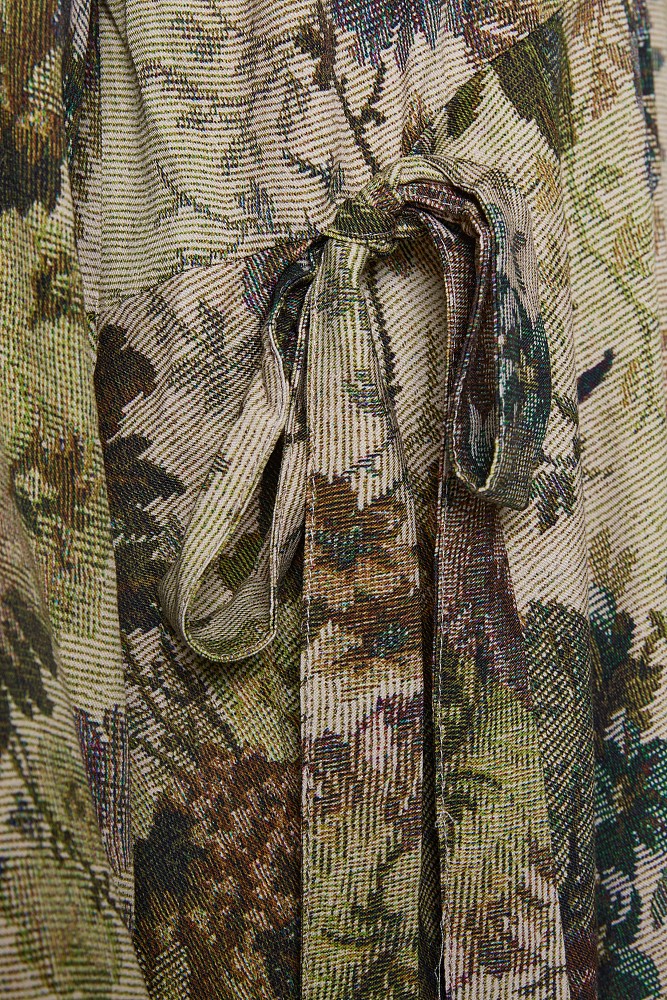 Floral blouse with an asymmetrical hem