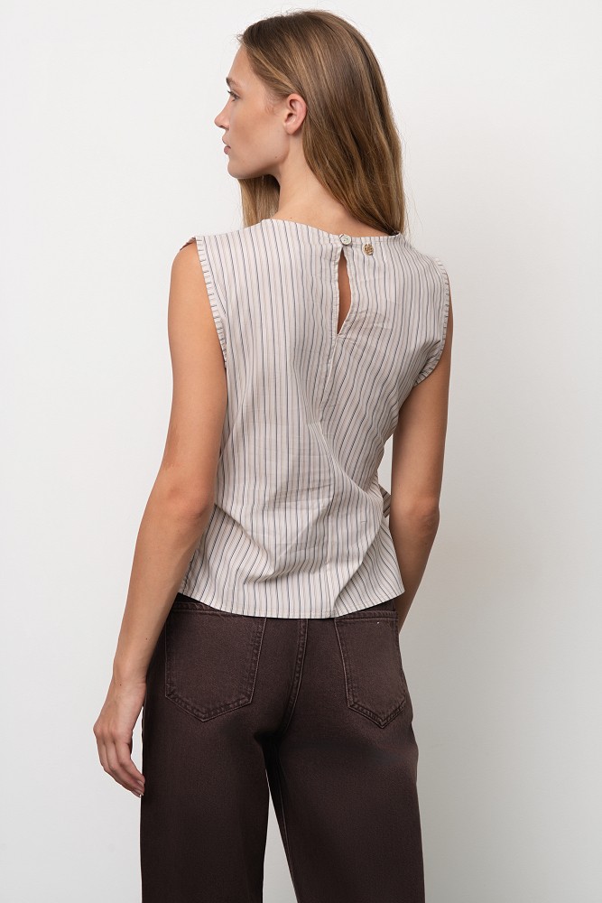 Sleeveless striped top with a decorative bow