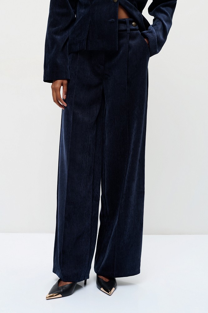 Pleated velvet-look trousers