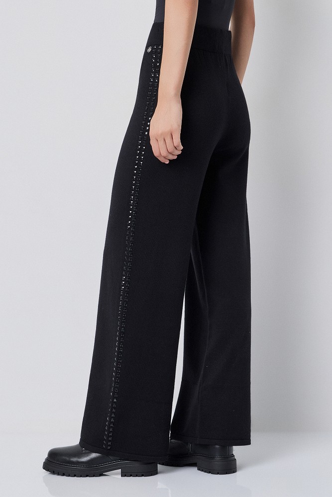 Pantalones de punto con botones a presión laterales