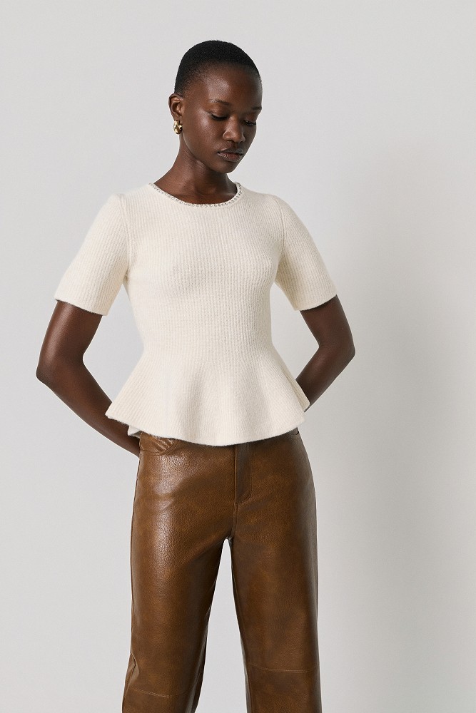 Pulover stil peplum cu decolteu cu pietricele