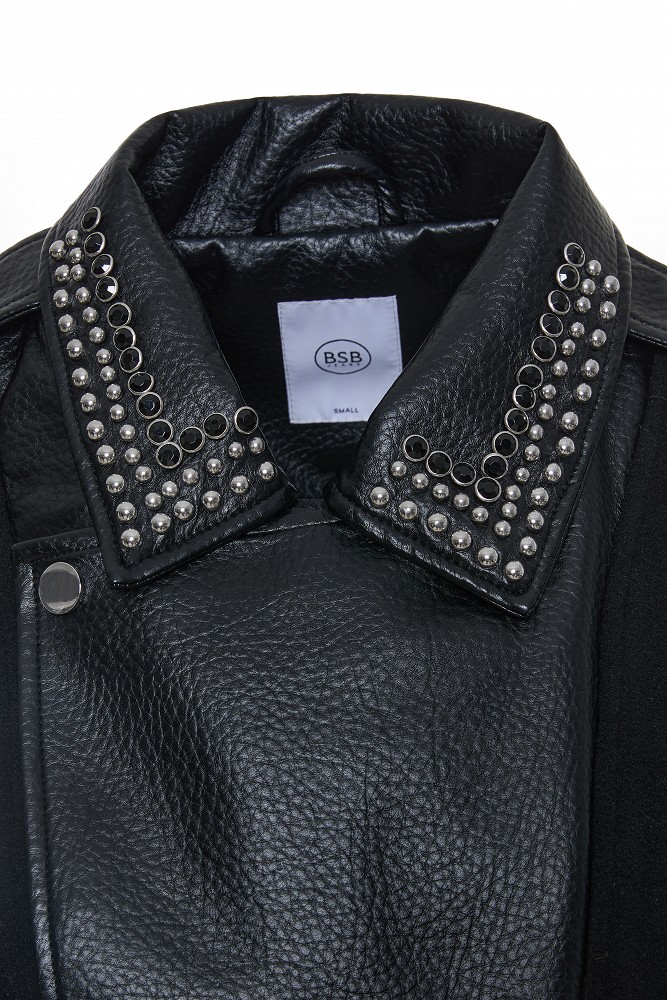 Cape with a combination of leather-look and wool fabric