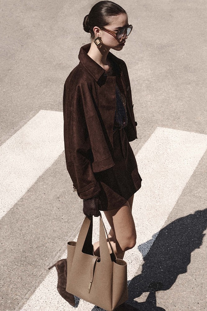 Shopper bag with a gold-tone buckle