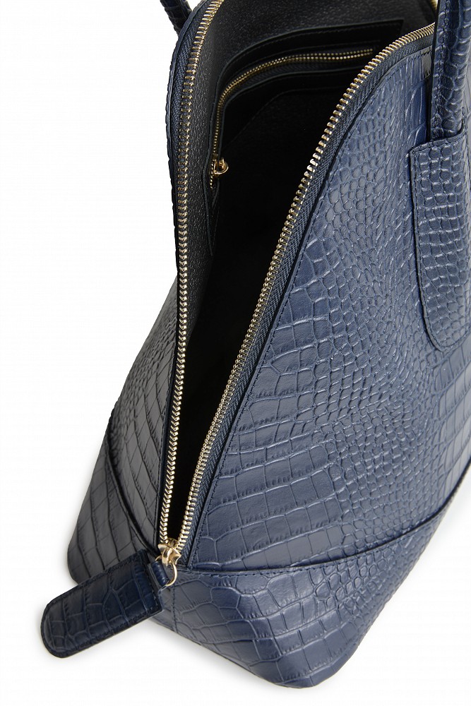 Handbag with asymmetric shape and croc-effect texture
