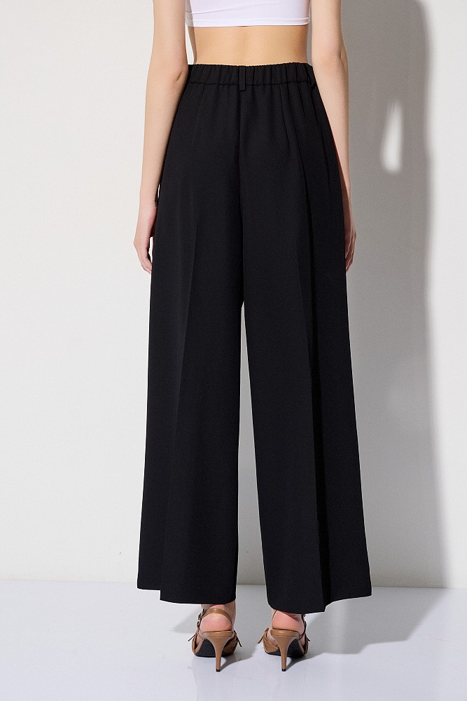 Pantalones de crepé con pliegues