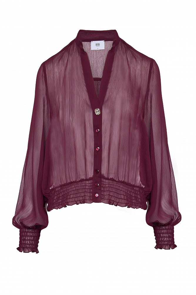 Semi-sheer top with smocked details
