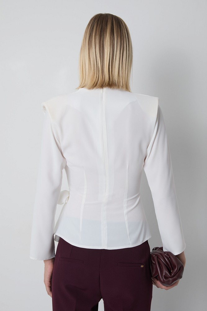 Blouse with a waist tie detail