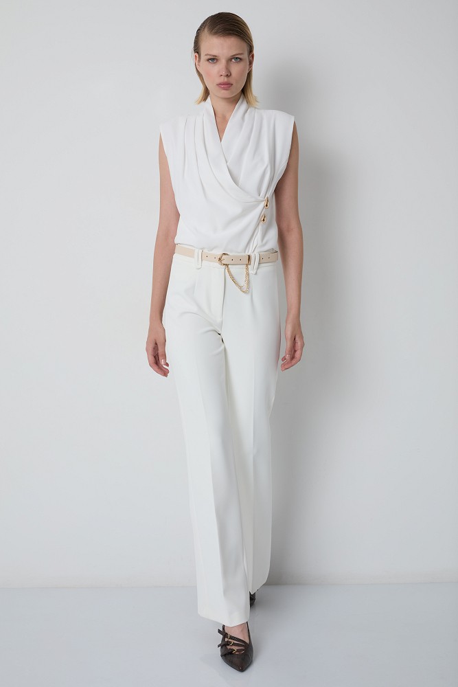 High-waisted flared trousers with belt