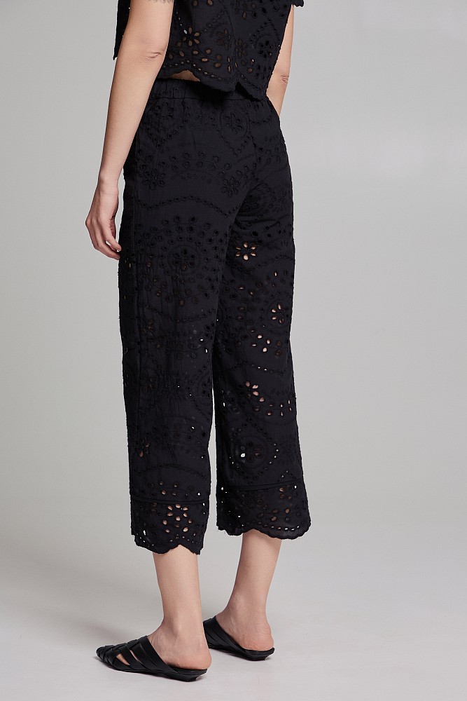 Pants with cutwork and stras