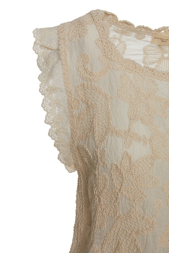 Sleeveless embroidered top with buttons