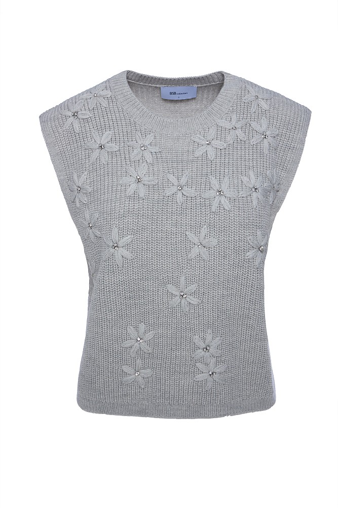 Sleeveless sweater with knitted flowers