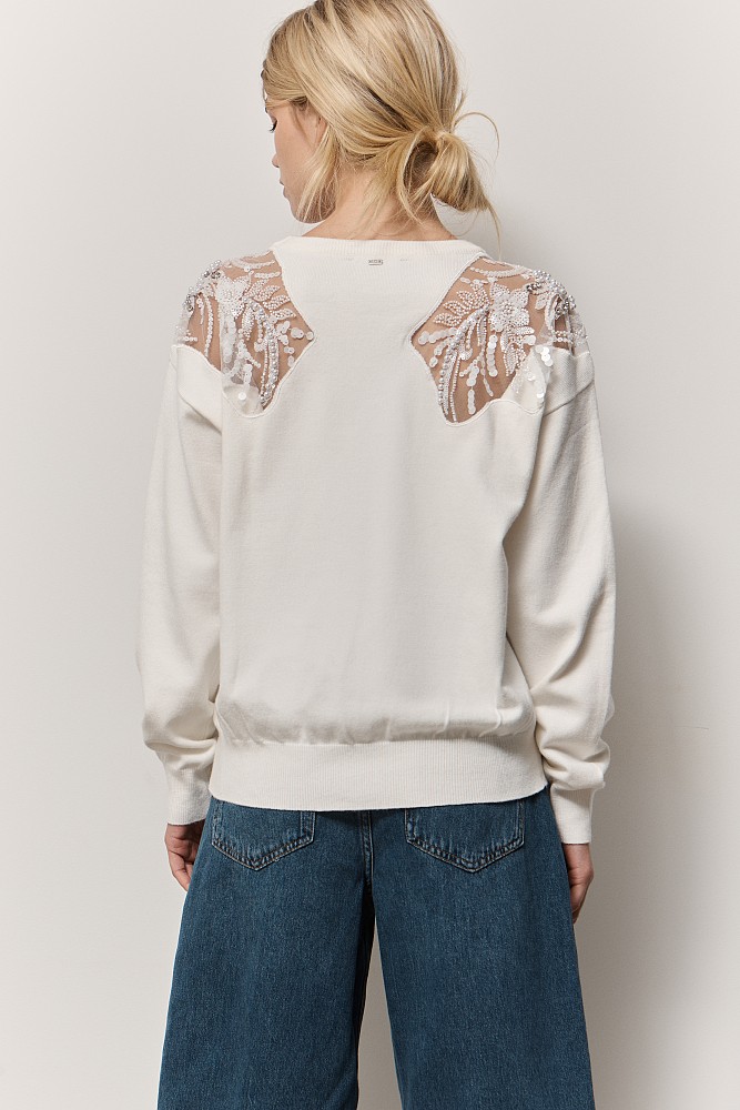 Sweater with motive and beads