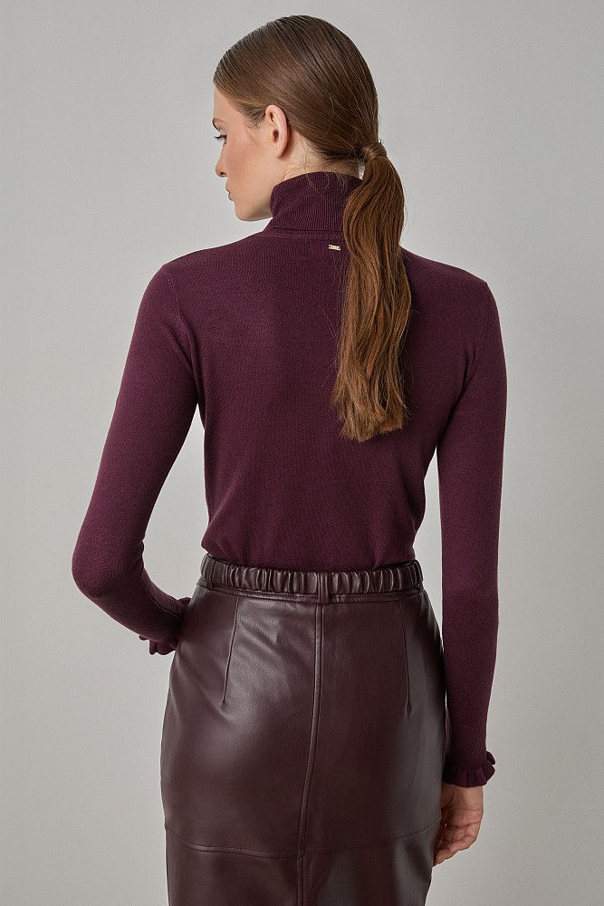 Turtleneck sweater with frills on the sleeves
