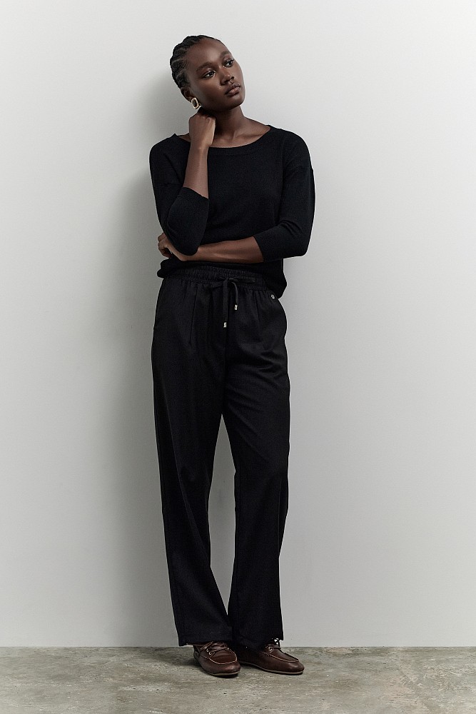 Pants with self-tie strap