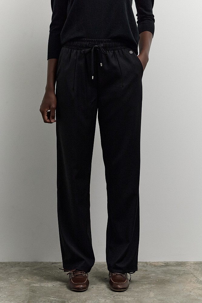 Pants with self-tie strap
