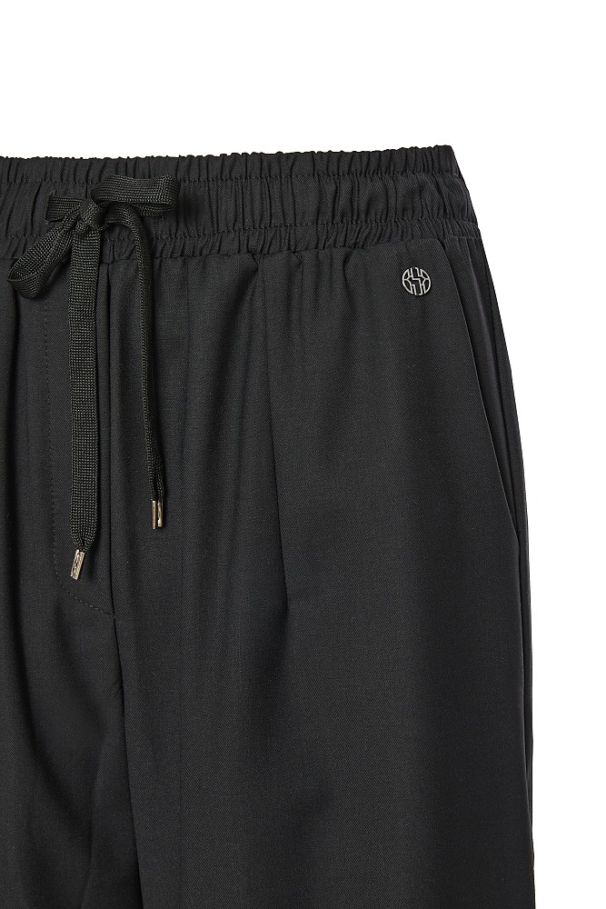 Pants with self-tie strap