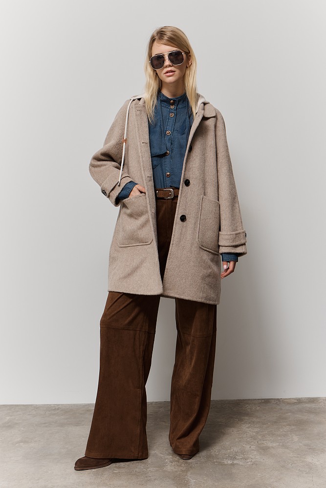 Coat with knitted hood
