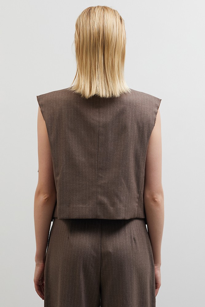 Striped vest with applique bows