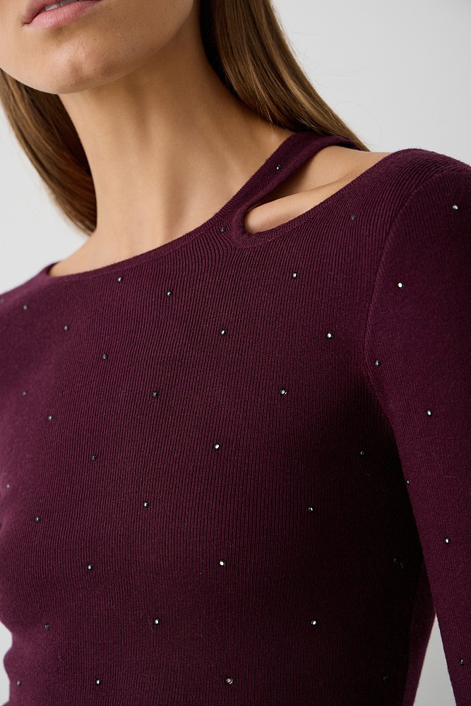Cut out sweater with rhinestones