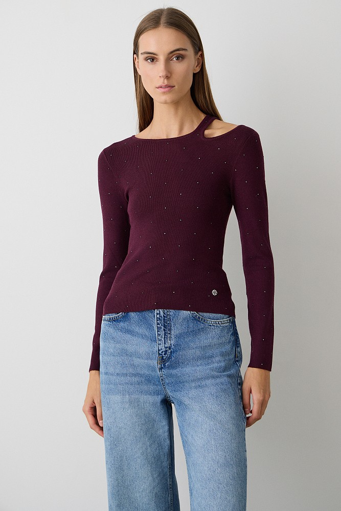 Cut out sweater with rhinestones