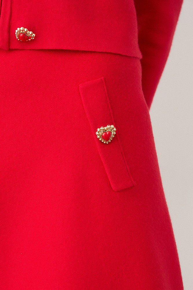 Mini knitted skirt with decorative buttons