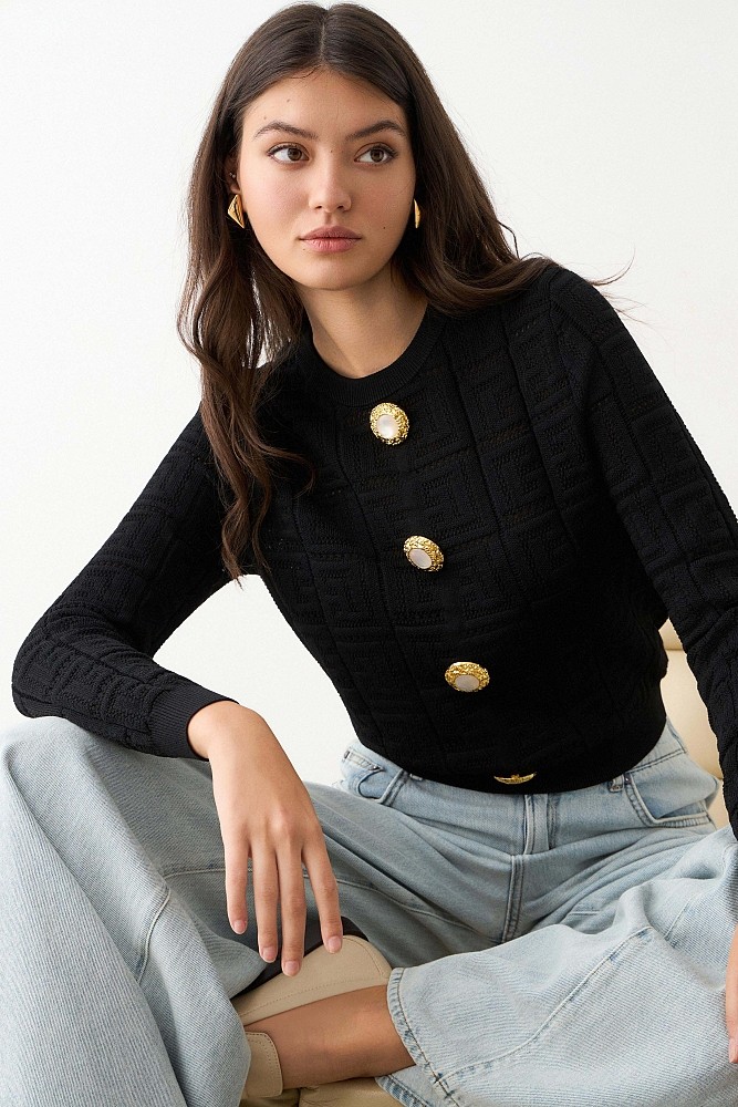 Sweater with bejewelled buttons