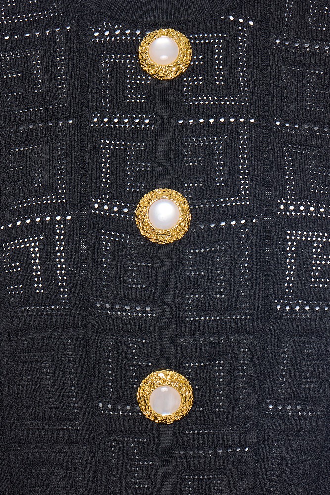 Sweater with bejewelled buttons