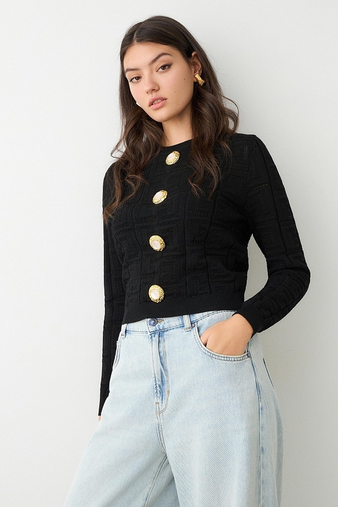 Sweater with bejewelled buttons