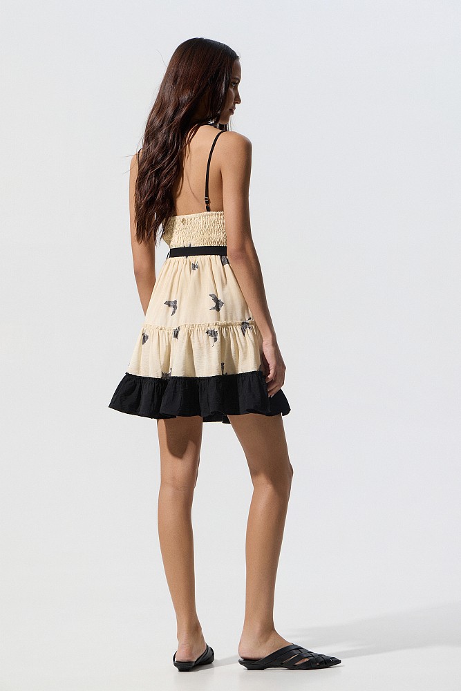 Vestido mini estampado con volantes