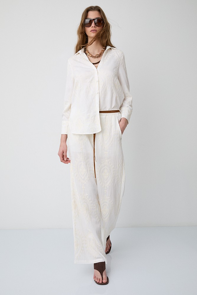 High-waisted trousers with embroidered detailing