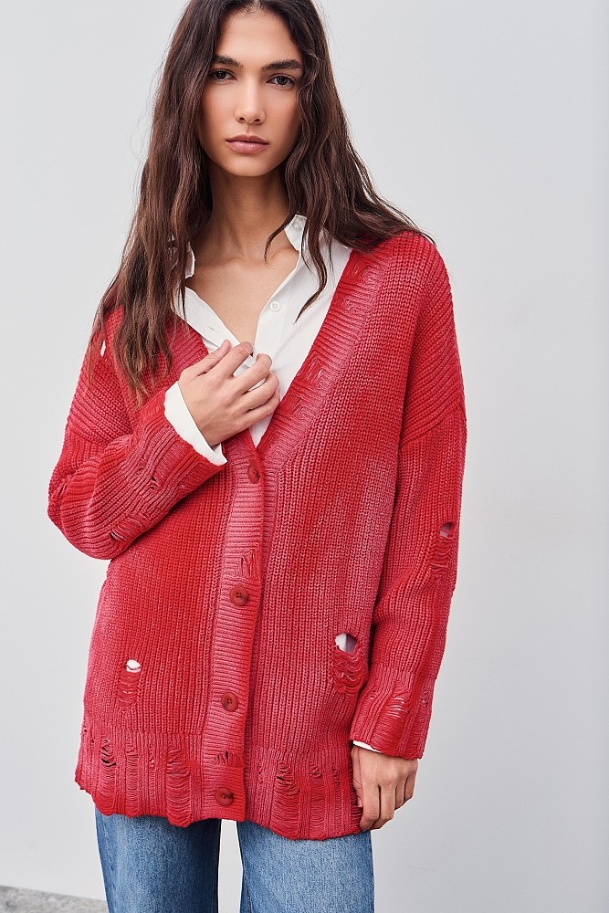 Knitted cardigan with rips