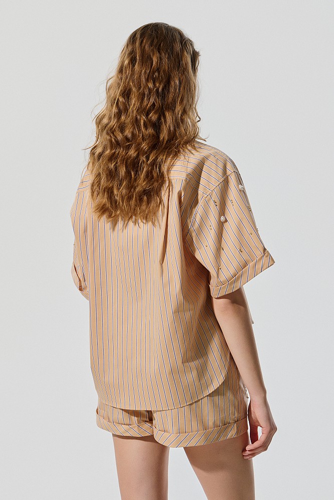Striped shirt with decorated details