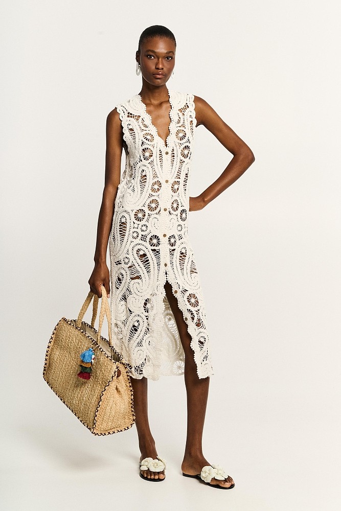 Knitted kaftan with cut work
