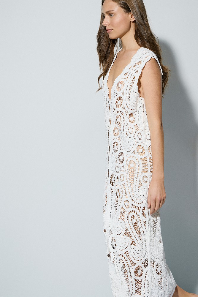 Knitted kaftan with cut work