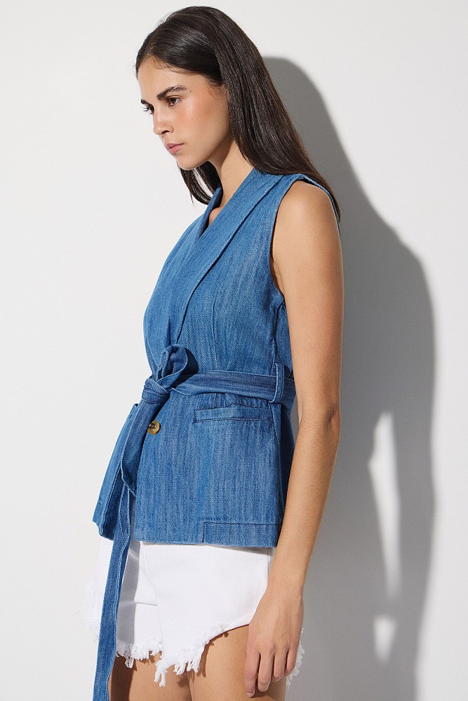 Long denim vest with a belt