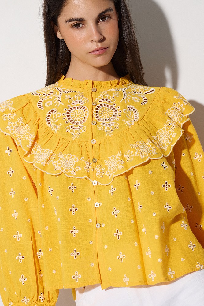 Camisa de algodón bordada con volantes