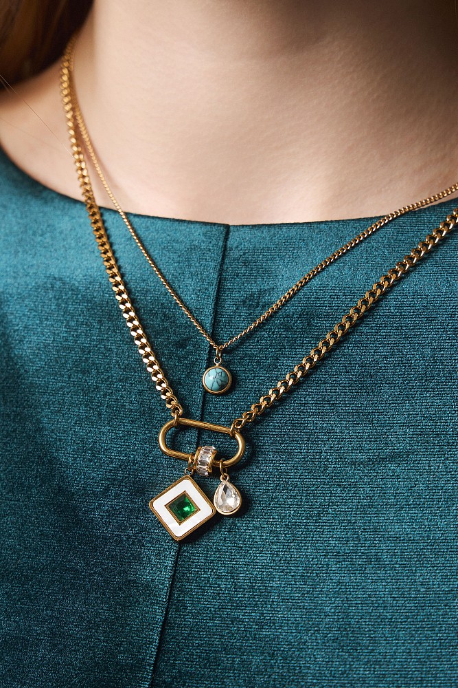 Hanging necklace with chain and charms