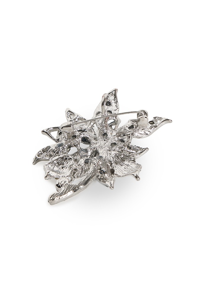 Broche en forma de flor con pedrería