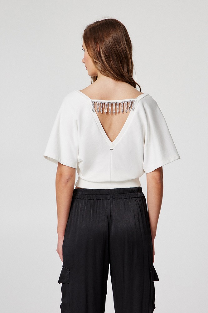 Wrap blouse with rhinestones on the back