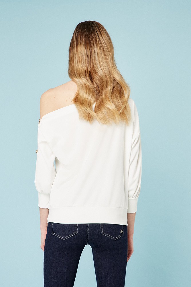 Off-shoulder blouse with bejeweled buttons