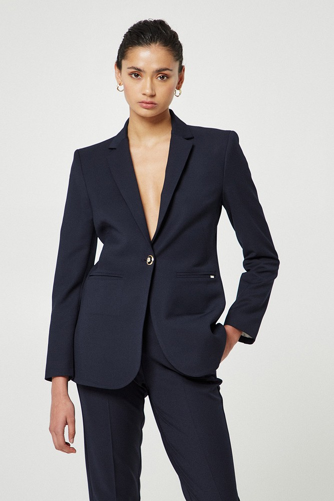 Tailored blazer with bejeweled button