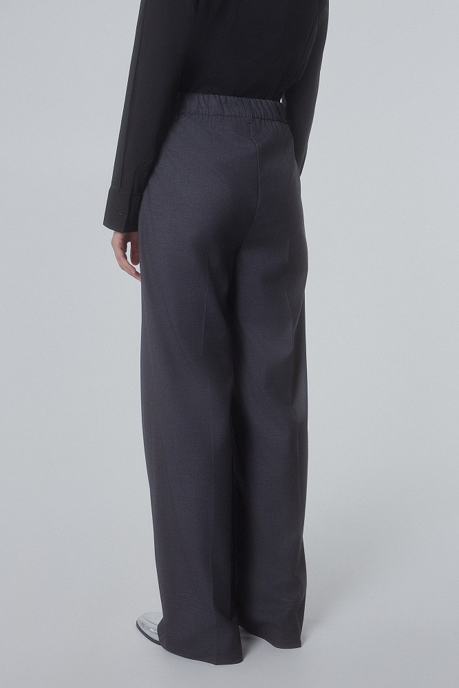 Trousers with elasticated waistband