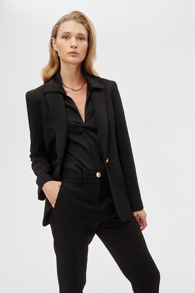 Tailored blazer with bejeweled button

