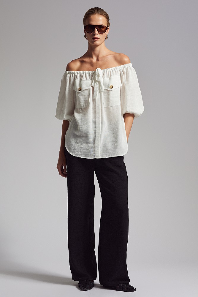 Off-shoulder blouse with decorative pockets
