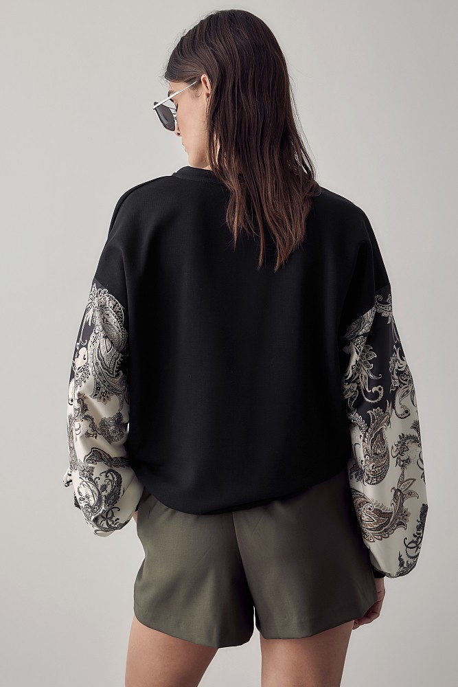 Sweater with printed satin sleeves