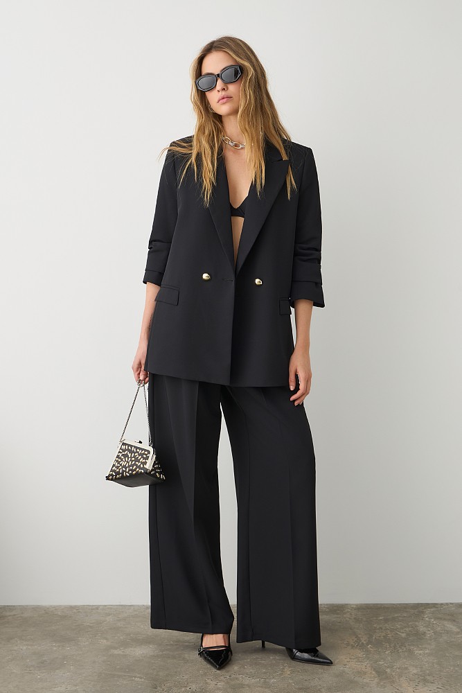 Pants with pleats and elasticated waist