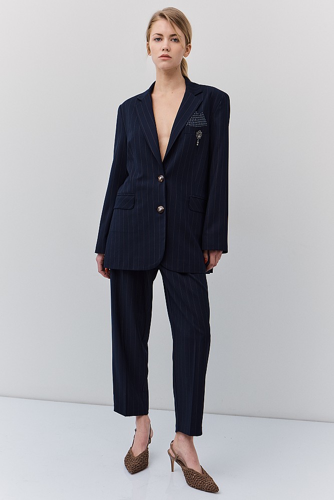Striped blazer with bejeweled pin